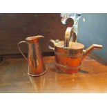 A copper watering can and jug (2)