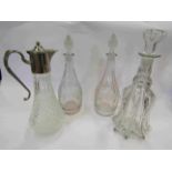 Three glass decanters and a plate/glass jug