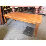 A 1970's teak coffee table,