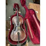 A 19th Century cello bearing Guadagnini label to sound hole, hard cased with bow,