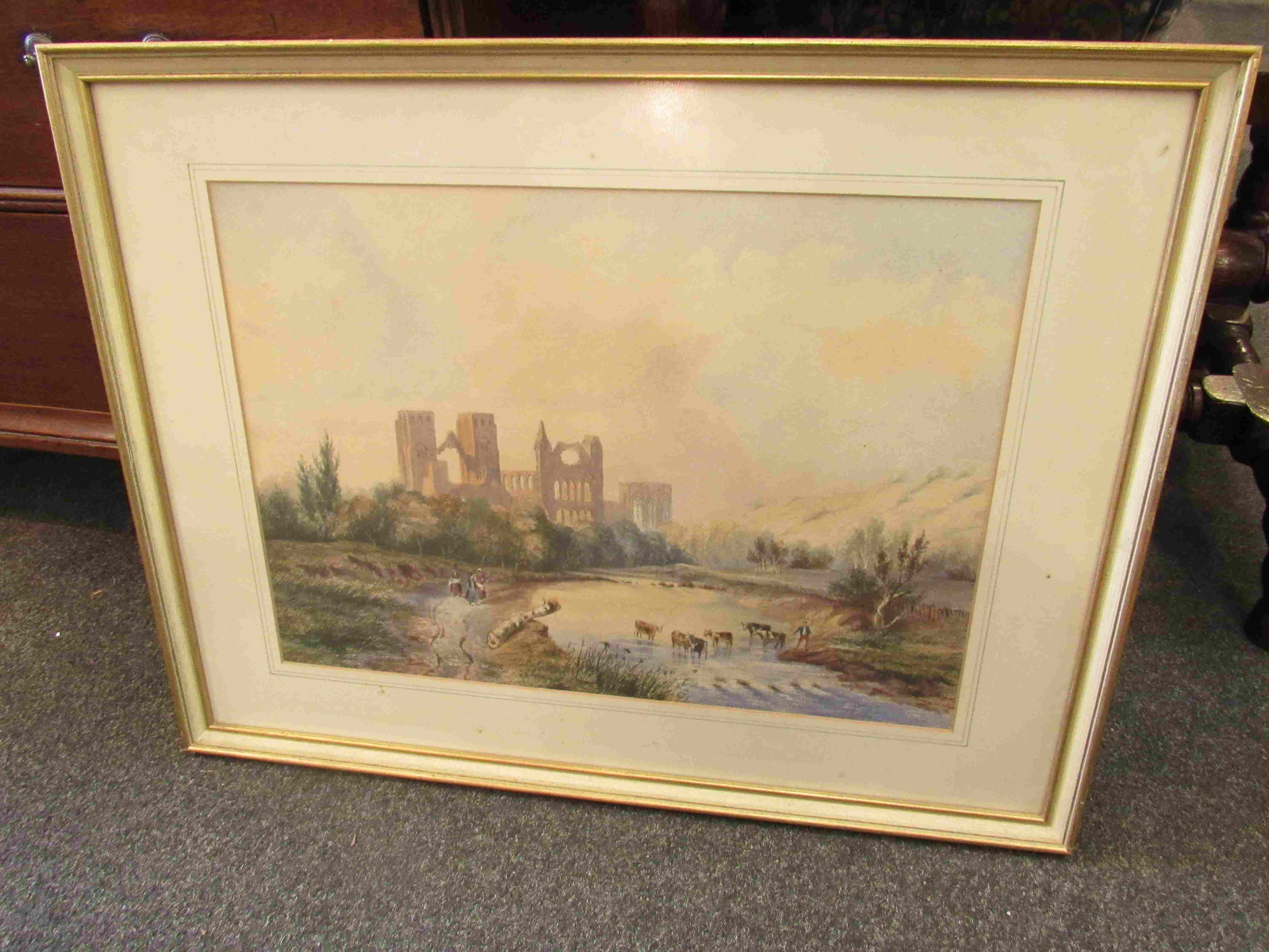 ENGLISH SCHOOL XIX Century: A framed and glazed watercolour - Abbey ruins in a river valley with