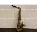 A mid 20th Century brass alto saxophone