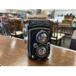 A MPP Microcord twin lens reflex reflex camera with lens cover