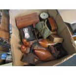 A box containing wooden boxes, bell, shoe inserts, car ashtrays etc.