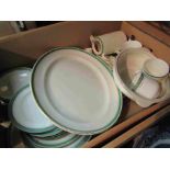 A selection of Dunn Bernett white ground dinner wares with green and gilt rim