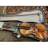 A full size violin of amber tone, pale wood chin rest, cased, 59.