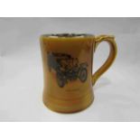 A one pint beer mug circa 1903, veteran car design by Wade, England,