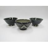 KAREN BUNTING (Contemporary): Three studio pottery bowls with painted designs in blue.