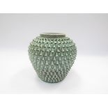 A Danish pottery vase, green glazed over white with incised pulled down vertical scrape detail.