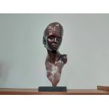 A modern painted metal female bust, set on black marble base, unsigned,