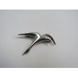 An Orla Gorie silver brooch in the form of a Gull,