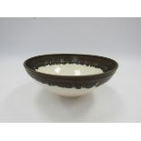 BILL MOORE (XX) A studio porcelain bowl in white with manganese drip rim. 15.5cm diameter x 6.
