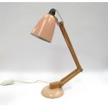 A Mac lamp with pink shade and base