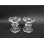 A pair of Iittala "Festivo" candlesticks by Timo Sarpanera, single ring stems.