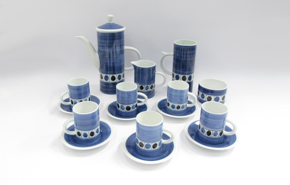 A Cinque Ports Rye Pottery coffee set comprising coffee pot, sugar bowl, milk jug, tall mug,