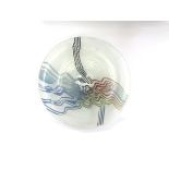 JOHN CHIPPERFIELD (XX) A studio glass charger in pale blue with lines of red,