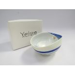 A Yalos Murano glass bowl with pinched sides, blue and white swirl.