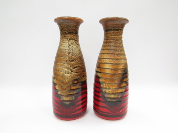 A pair of Scheurich Keramik ribbed vases with red lava, tan and black. No. 293-30.