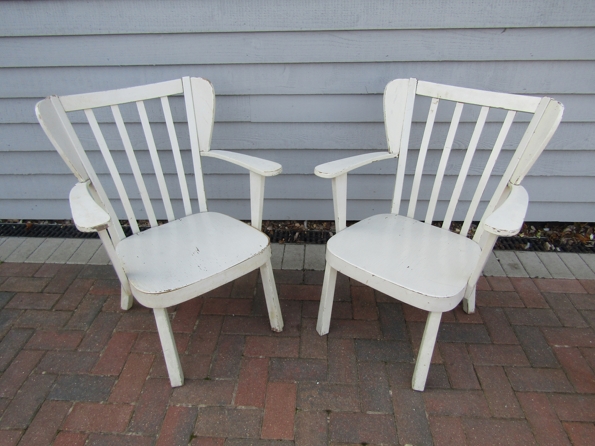A pair of 1940's 'Canada' white painted armchairs by Fritz Hansen, wing back,