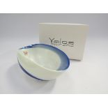A Yalos Murano glass bowl with pinched sides, blue and white swirl.