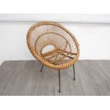 An Italian 1950's cane and metal chair by Franco Albini