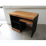 GEORGE SNEED (b.1927) - A hardwood and ebonised desk a/f. 93cm x 50.5cm x 72.