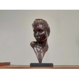 A modern painted metal female bust, set on black marble base, unsigned,