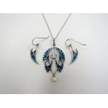 An Art Nouveau revival silver and enamel open work pendant with pearl drop and matching earrings,