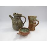 A St Ives Pottery standard ware dish and two Aylesford Pottery items, coffee pot and mug,