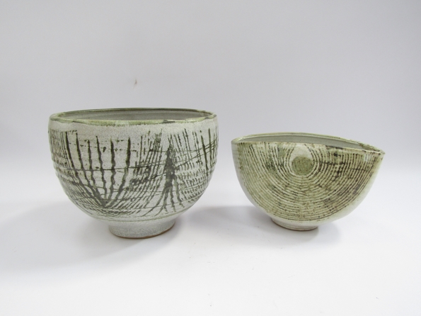 PETER LANE (b.1932) A studio pottery stoneware bowl with painted green line detail.