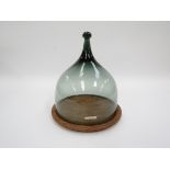 An Addeland of Norway glass cheese dome with hardwood stand,