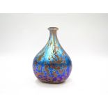 NORMAN STUART CLARKE (b.1944): A studio glass vase, iridescent blue, purple and ochre colours.