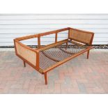 A 1950's Danish teak and rattan sofa daybed, Model 451,