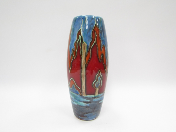 An Anita Harris Pottery vase. Trial piece, landscape with trees. Printed marks to base. 25.