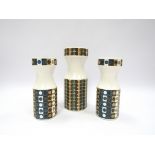 A pair of Hornsea vases designed by John Clappison, 16cm high together with another similar design,