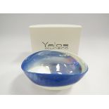 A Yalos Murano glass bowl with pinched sides, blue and white swirl.