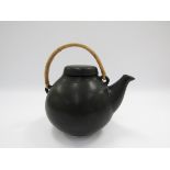 Arabia - 1950's Ulla Procope designed matt black teapot with cane handle.