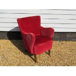 A 1940's Danish small armchair, red velour upholstery,