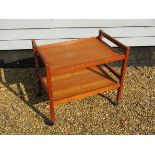 A Danish teak two-tiered trolley. Stamped underneath. 71cm x 46.5cm x 64.