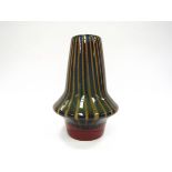 A Chribska glass vase by Josef Hospodska with mica stripe detail in blue and green with cranberry