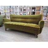 A 1940's Danish three seater sofa, original green velour upholstery,