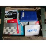 A box of mixed owners handbooks including Fiat,