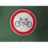 A circular enamelled bicycle sign,