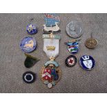 A quantity of mixed badges