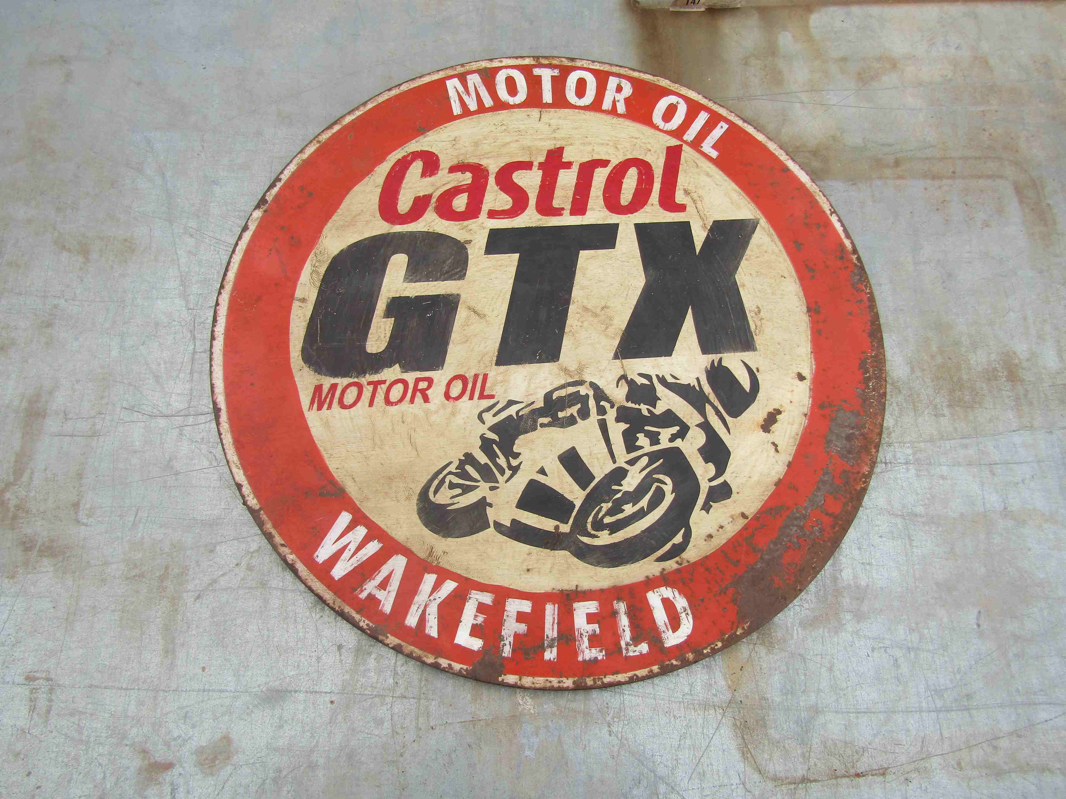 A Castrol GTX hand painted sign,