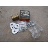 A bag of Renault and Mini spares including chrome bumper fixings and piston rings