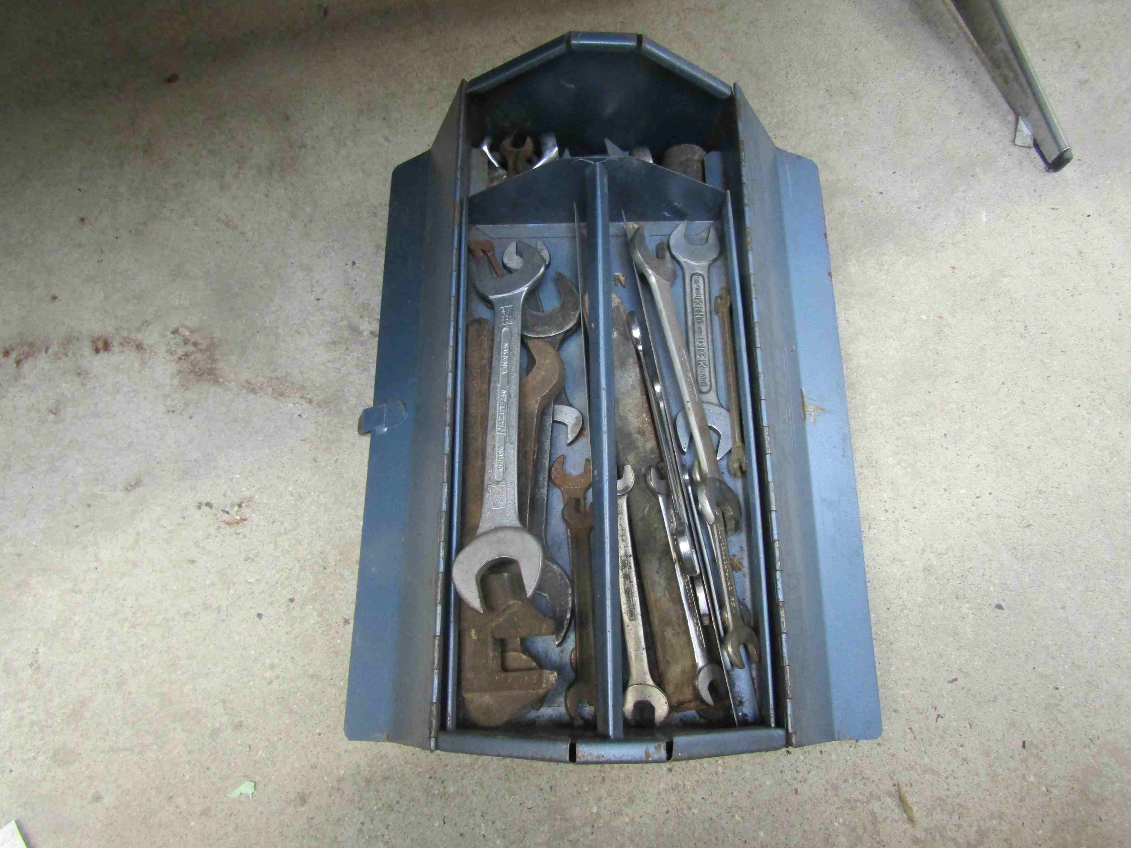 A toolbox containing mixed spanners including King Dick,