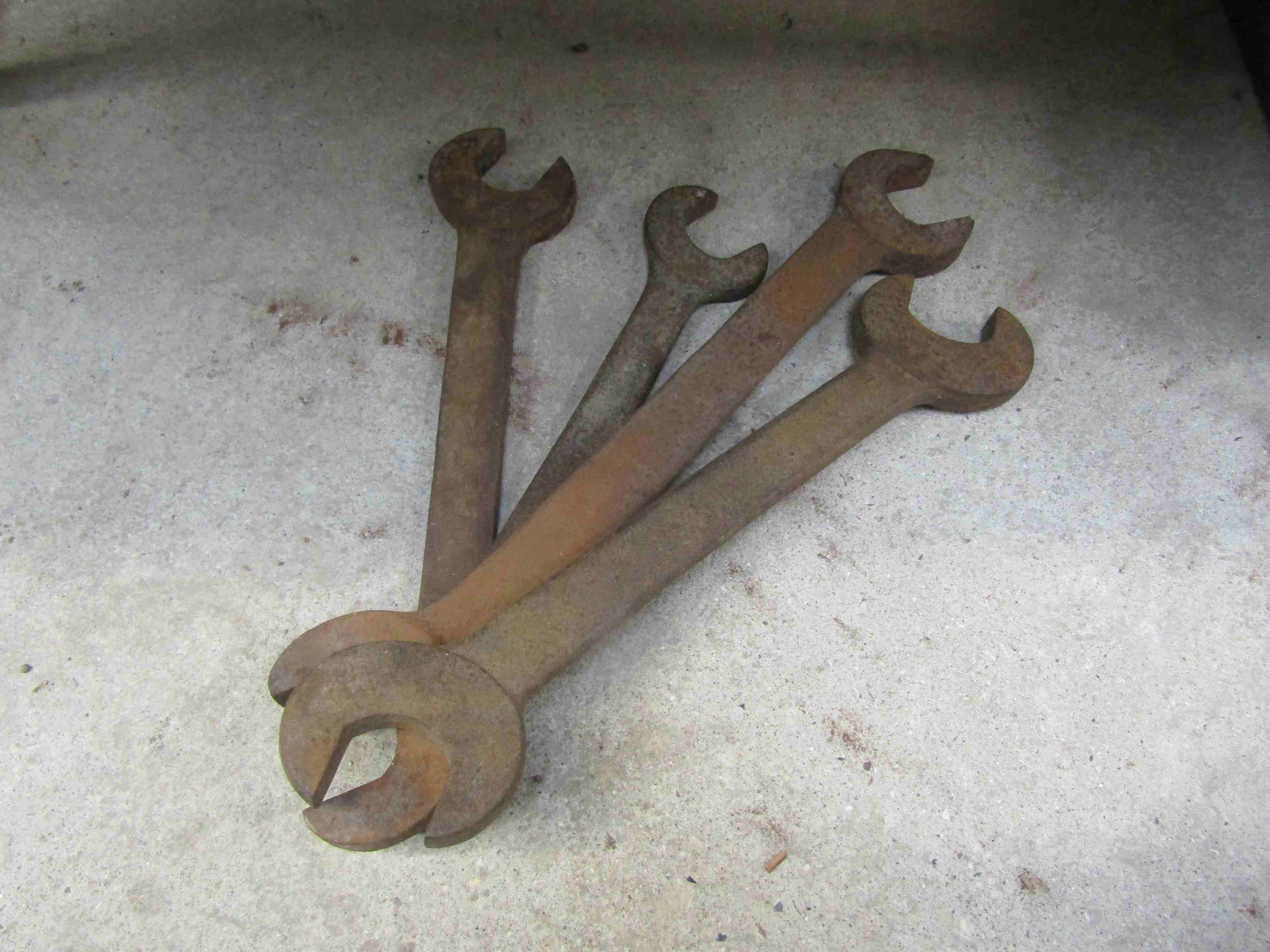 Four large spanners including Snail brand