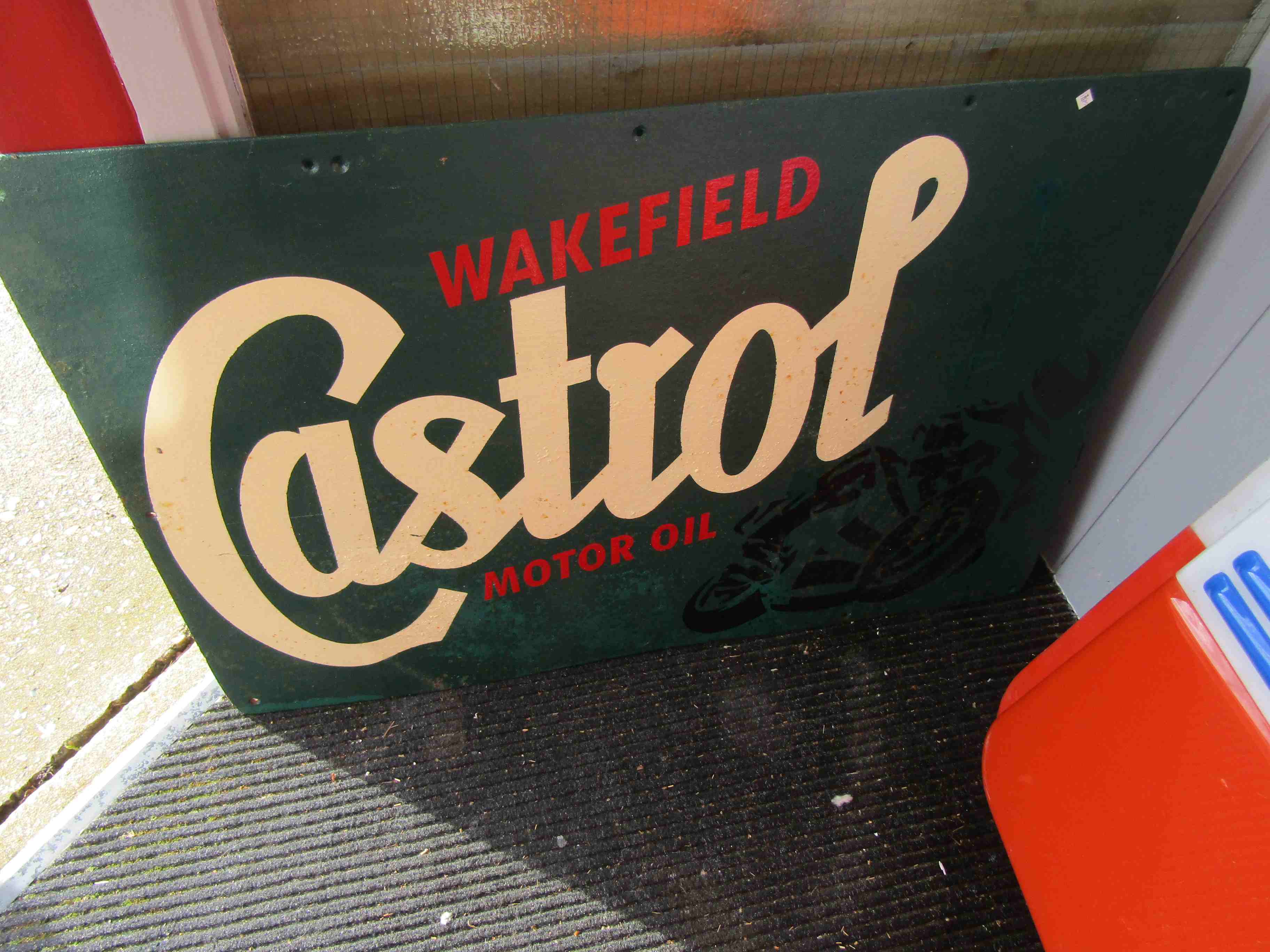 A hand painted iron Castrol Oil sign 67cm x 100cm