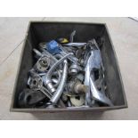 A tin of mixed chromed handles including ford and BMC